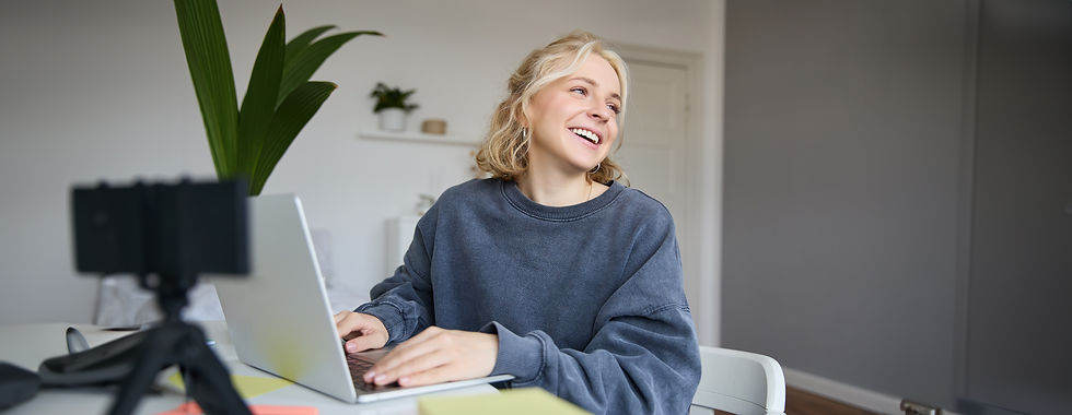 portrait-young-blond-woman-female-college-student-works-from-home-assignment-uses-laptop.j