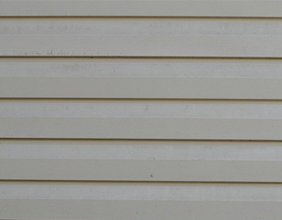 Light gray horizontal siding detail. Siding Replacement for a home exterior.