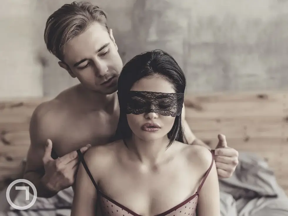 man and woman having intimate moment