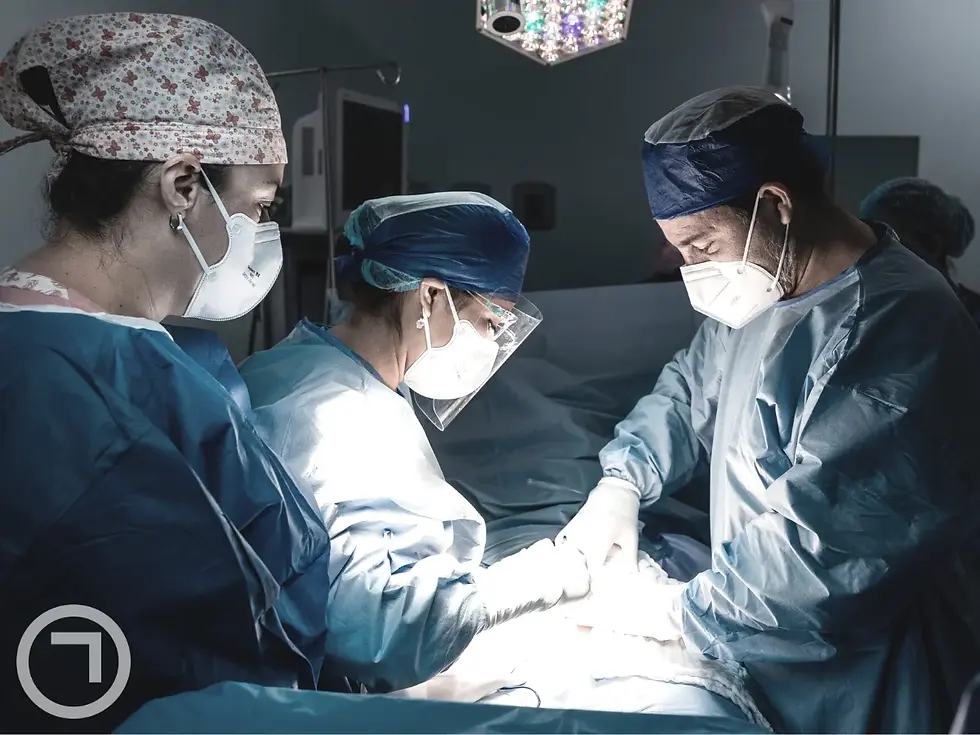 doctors performing surgery
