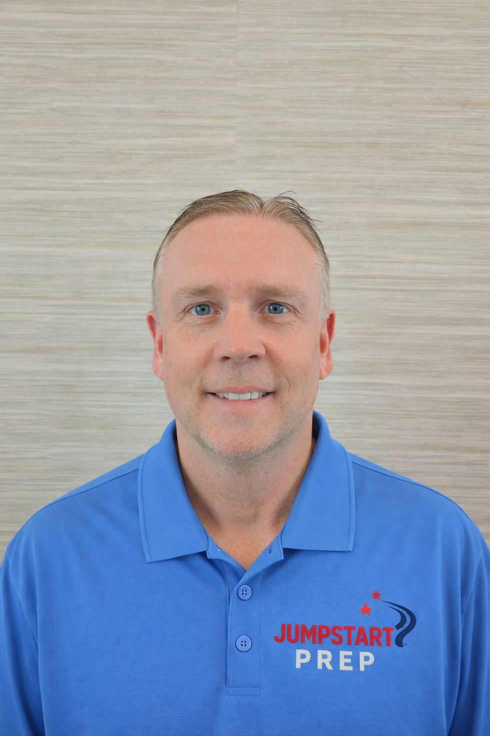 Friendly portrait with JumpStart Prep logo.png