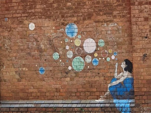 Girl Blowing Bubbles