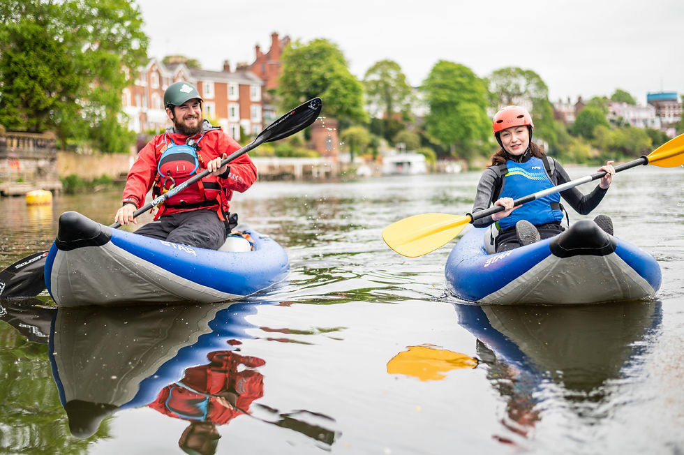 Kayaking in Chester with two people looking happy