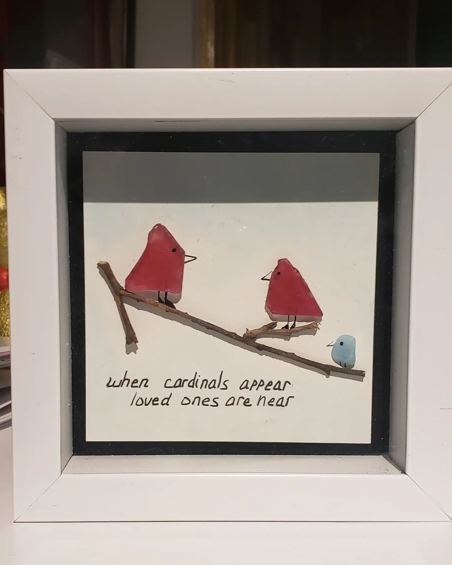 When cardinals appear, loved ones are near. Seaglass used for cardinals. Encased in white frame and glass. A great gift of sympathy.