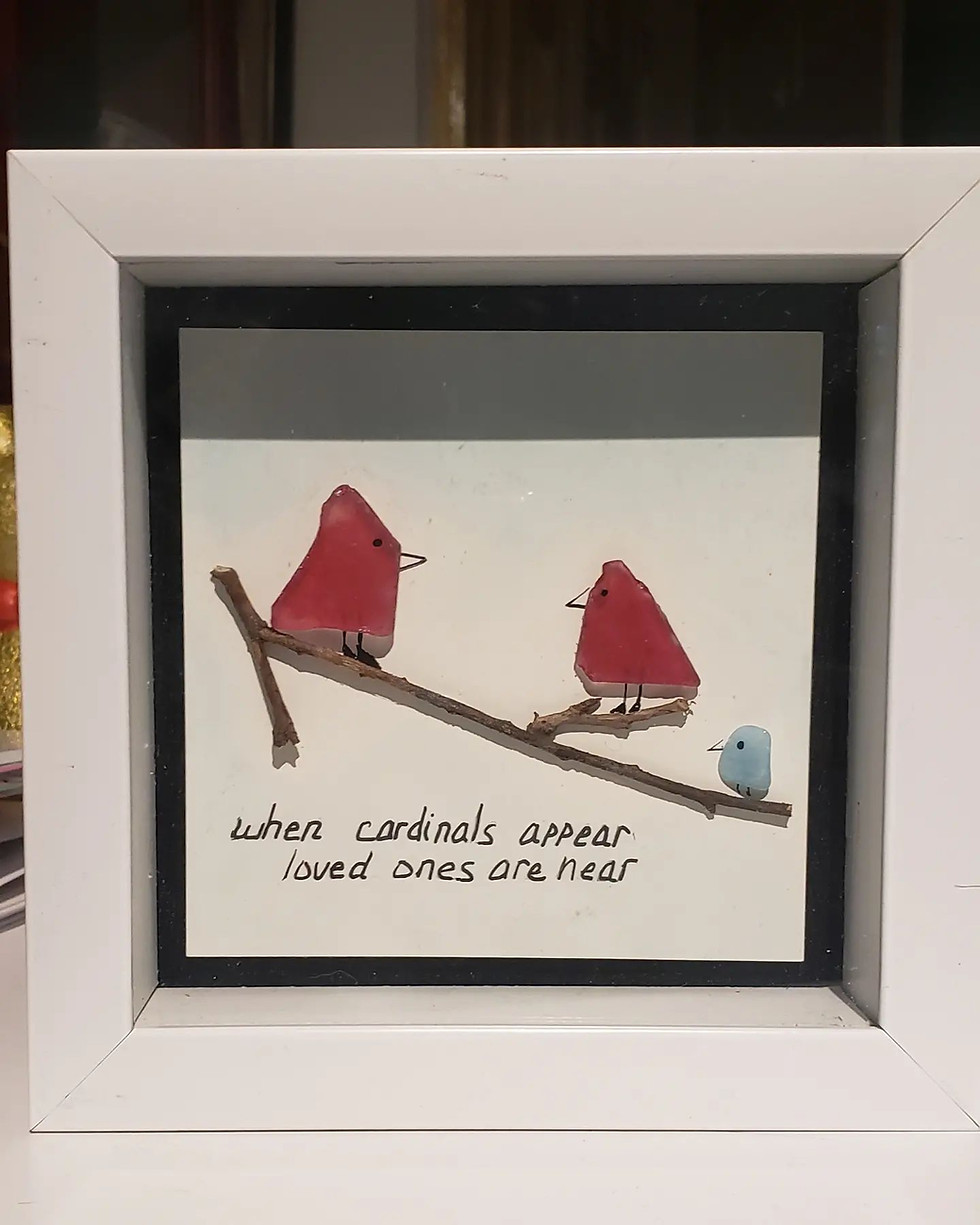 When cardinals appear, loved ones are near. Seaglass used for cardinals. Encased in white frame and glass. A great gift of sympathy.