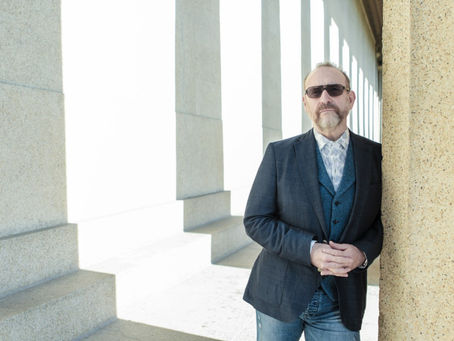 COLIN HAY: GIVE US A SONG YOU'RE NOT A FIREMAN, GIVE US A SONG TONIGHT.