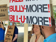 Residents protest against escalating surcharges and unsafe cladding
