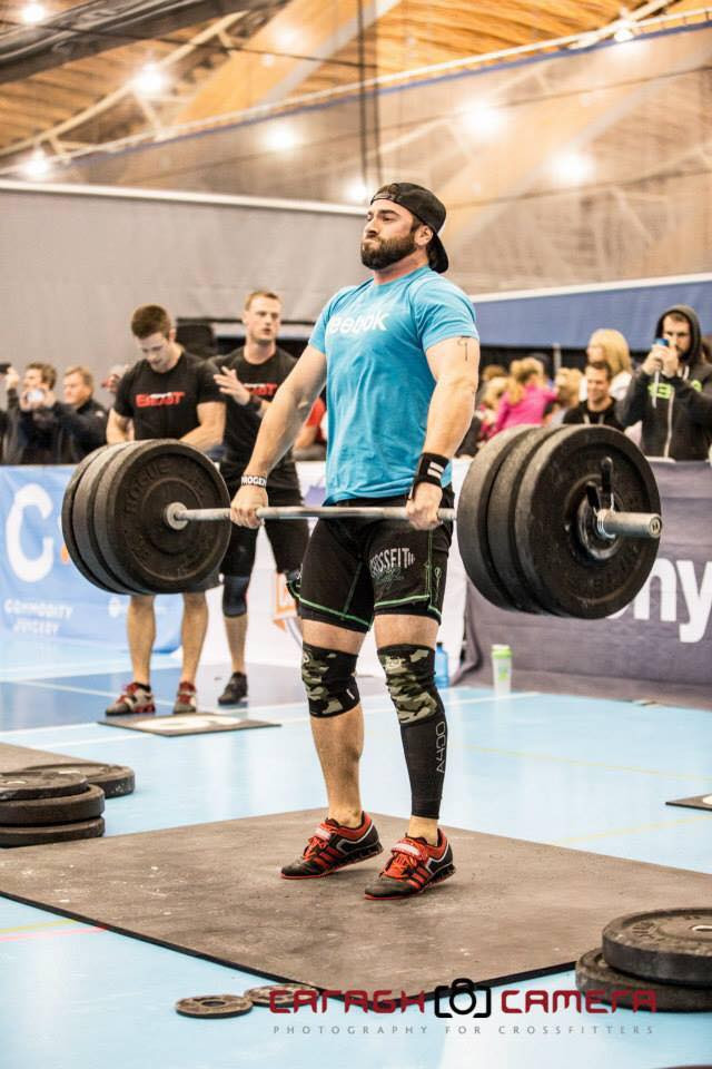 Coach Dub power clean in a crossfit competition