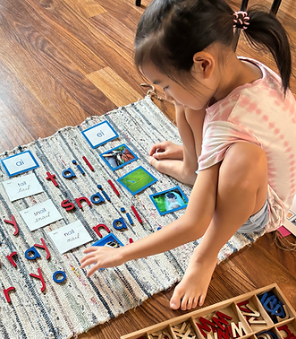 Child learning phonics at Extraordinary Adventures Academy in Katy, TX