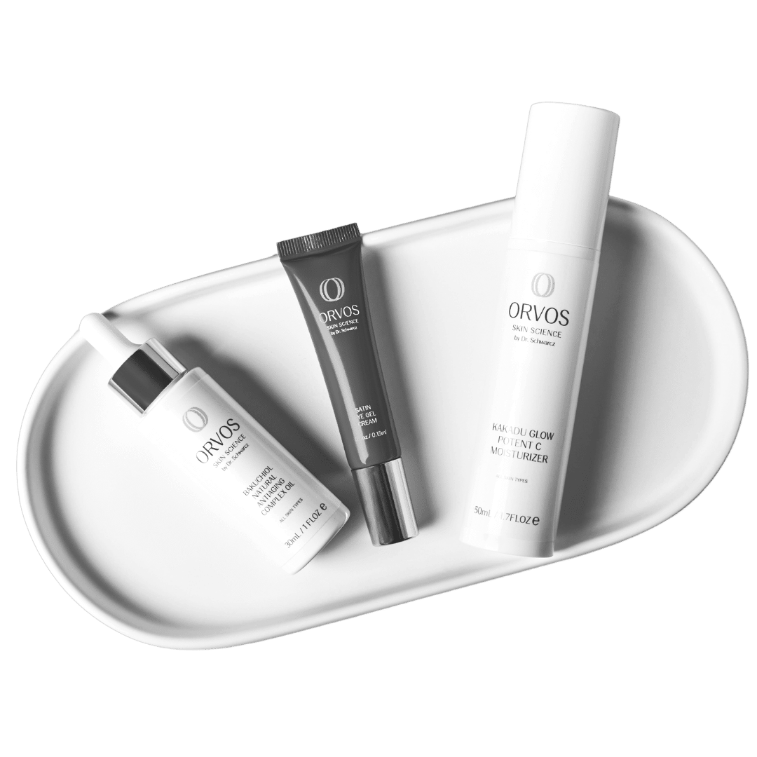 Products from Dr. Robert Schwarcz's Skincare line, Orvos Skin Science. Featuring an oil, an eye cream, and a moisturizer.