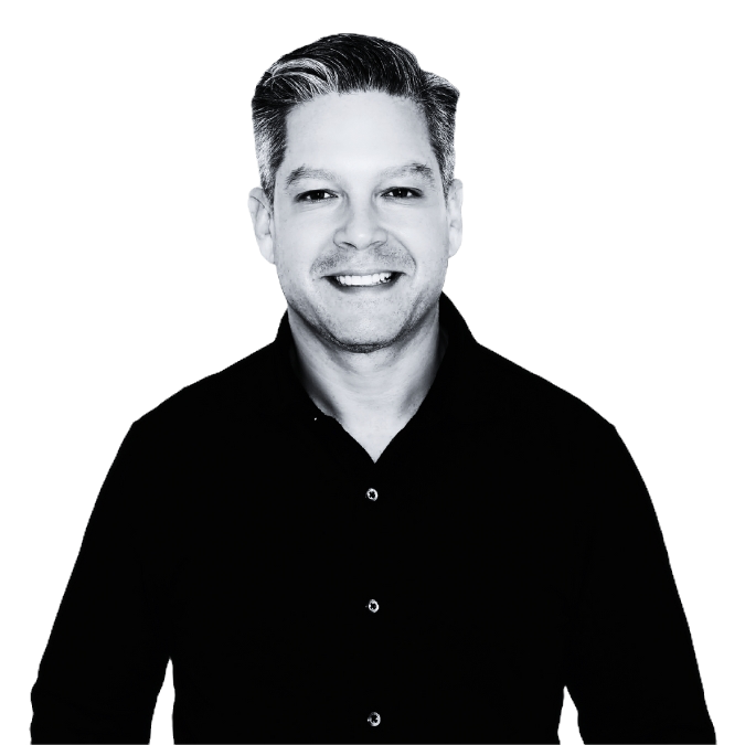 Black and white professional portrait of Dr. Robert Schwarcz, MD, smiling and wearing a dark button-up shirt.