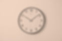 round analog wall clock pointing at 10_09_edited.jpg