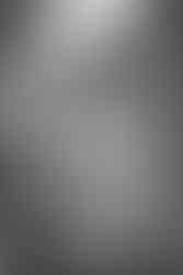 A dad holds his brand new baby.