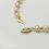 Thumbnail: 6.0-5.5mm White Japanese Akoya Pearl Bracelet with Gold Beads