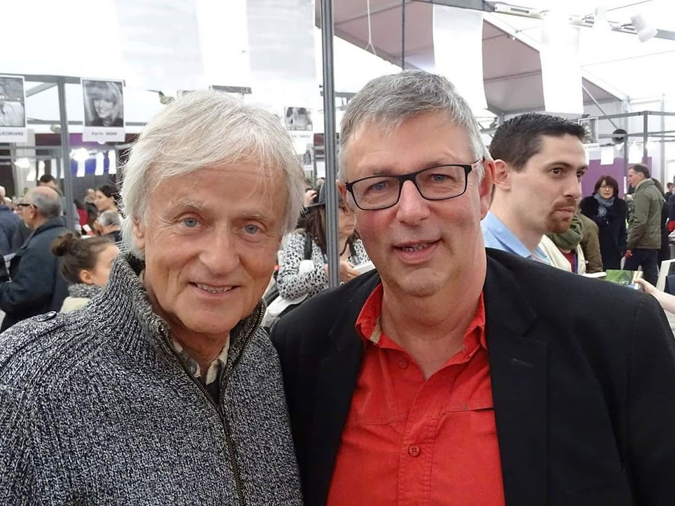 Complicité amusée entre le chanteur Dave et Laurent Bourdelas, Lire à Limoges 2016