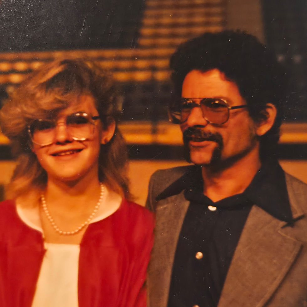 Image of a young Marie with her father.