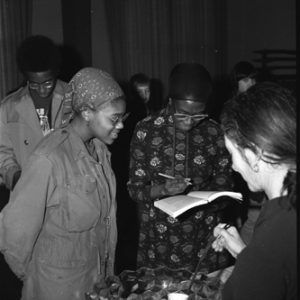 Brooks signing autographs