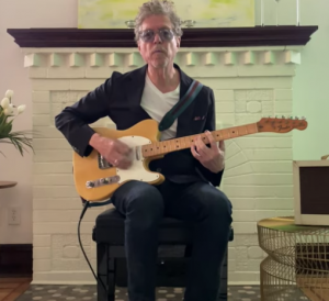 Singer-songwriter pens, performs song about Updike