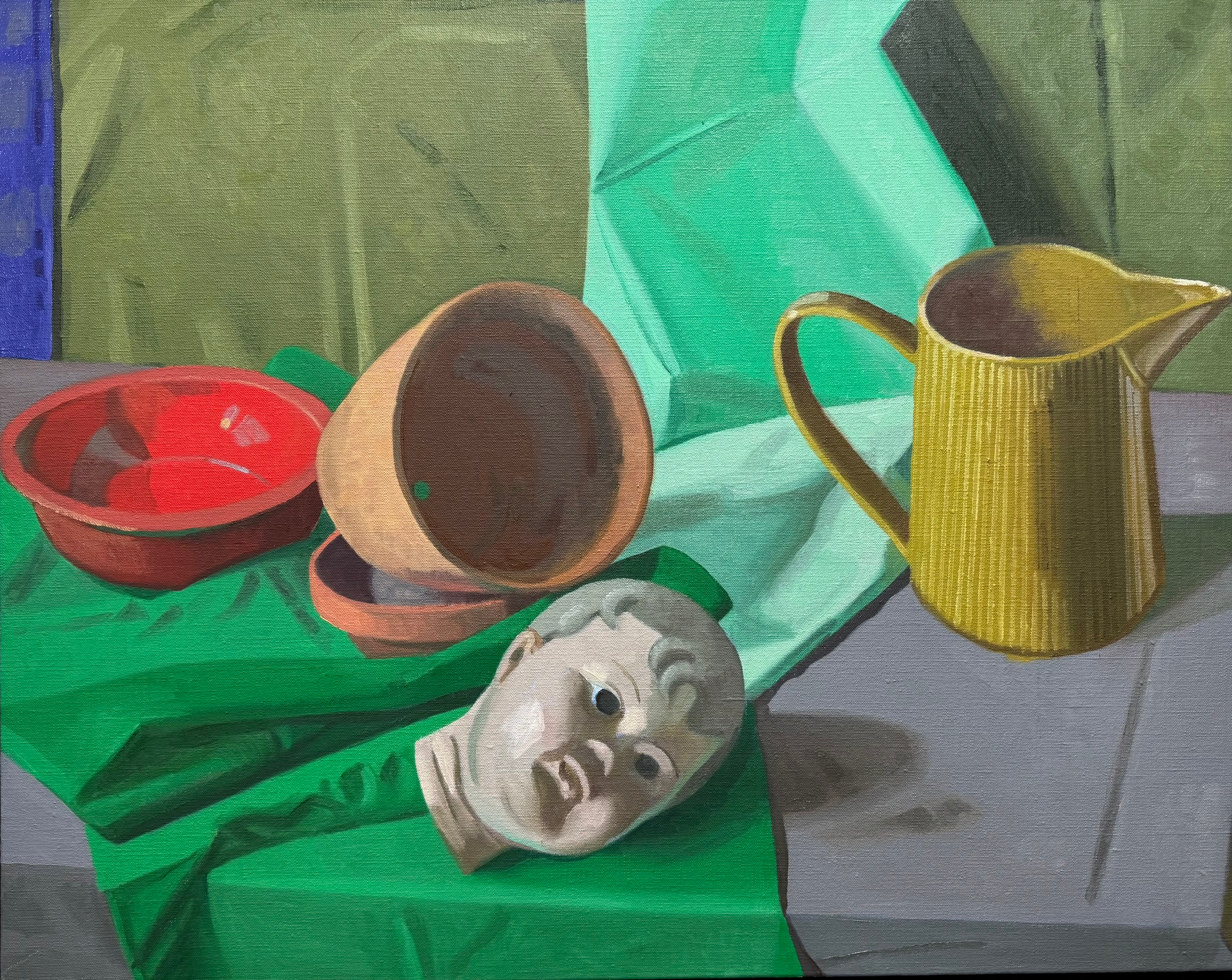 Doll head and yellow vase