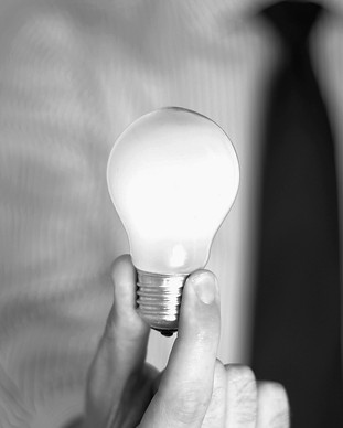 Light bulb in a hand