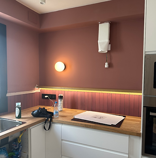 phasezero-construction-flat-barcelona-burgundy-kitchen-15.pn