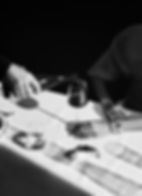 a black and white image of a glass of wine