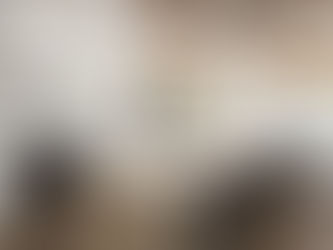 Bright, modern kitchen remodel in Olympia, WA with white cabinets and island seating