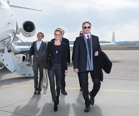 Elite passengers boarding a private jet - JETUP global luxury travel lifestyle