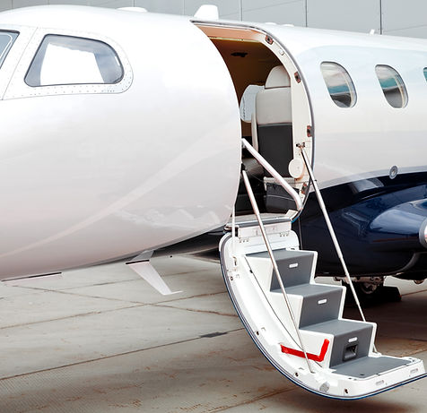 Professional flight crew providing elite service for a JETUP private jet journey