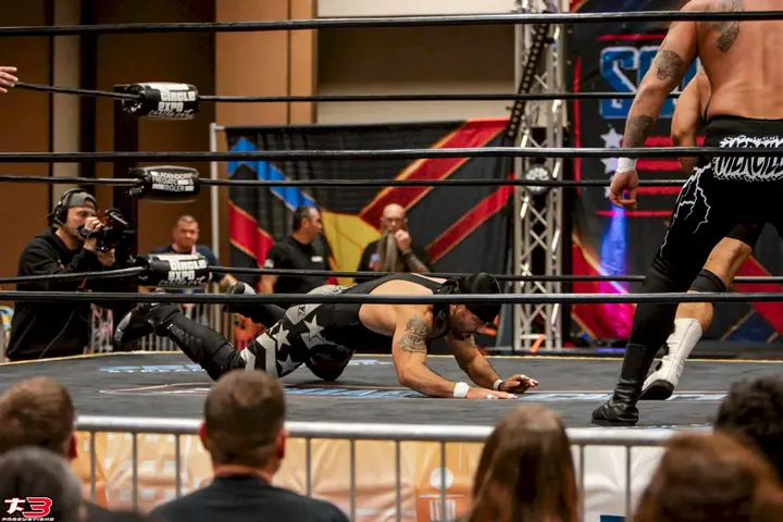 Fans enjoying live wrestling entertainment at Squared Circle Expo 2026