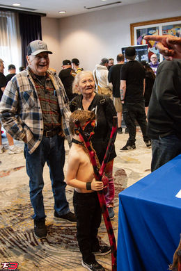 Vendor booths and fan engagement at wrestling convention