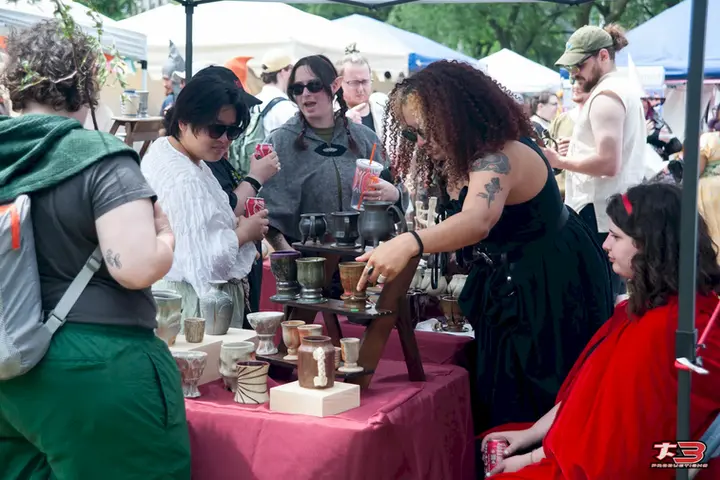 Guests visiting local artisan and vendor booths at Faire in the Field 2026 in Chicago.