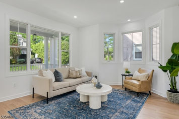 Open living and dining area with modern design and natural light