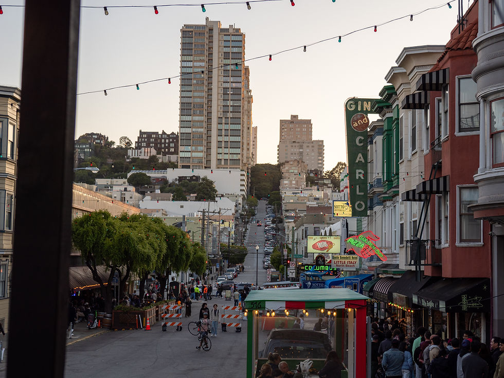 Rolling hills, packed sidewalks, neon pizza signs, no cars allowed: basically heaven.