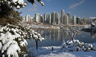 Vancouver city skyline showing importance of professional snow plowing, snow shovelling and winter road salting