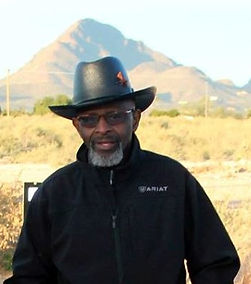 Pastor Brown Black Hat Outside.jpg
