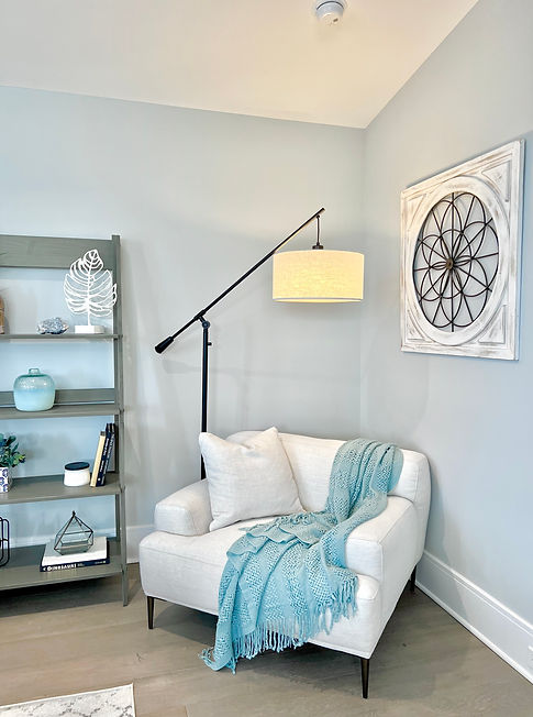 staged family room reading corner