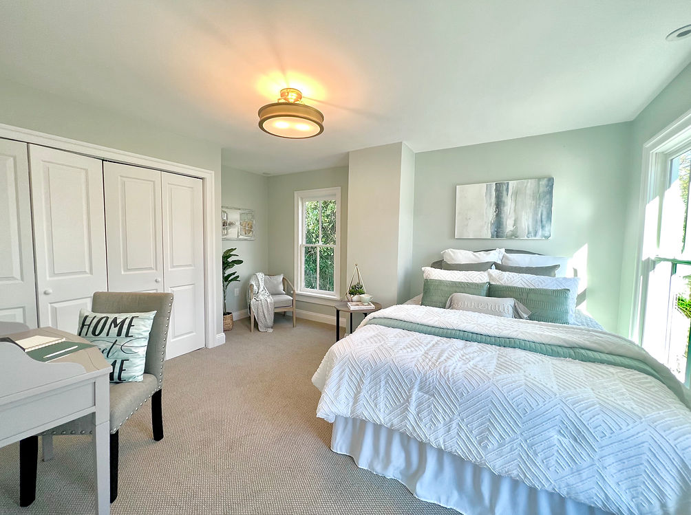 Staged bedroom green room