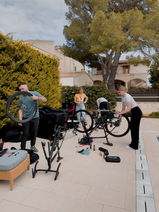 cyclists unpacking their bikes in Mallorca