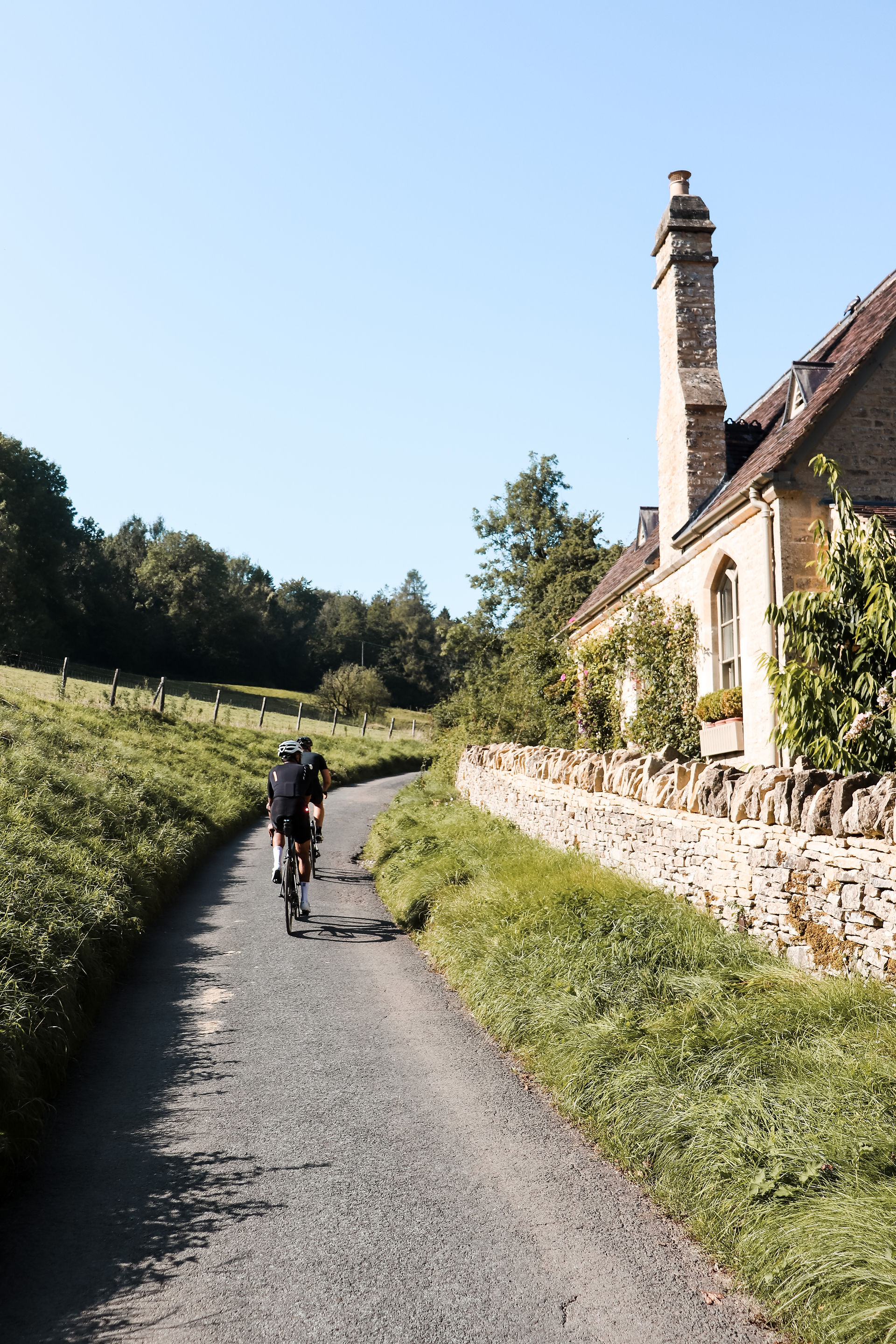 Road cyclists in the Cotswolds villages