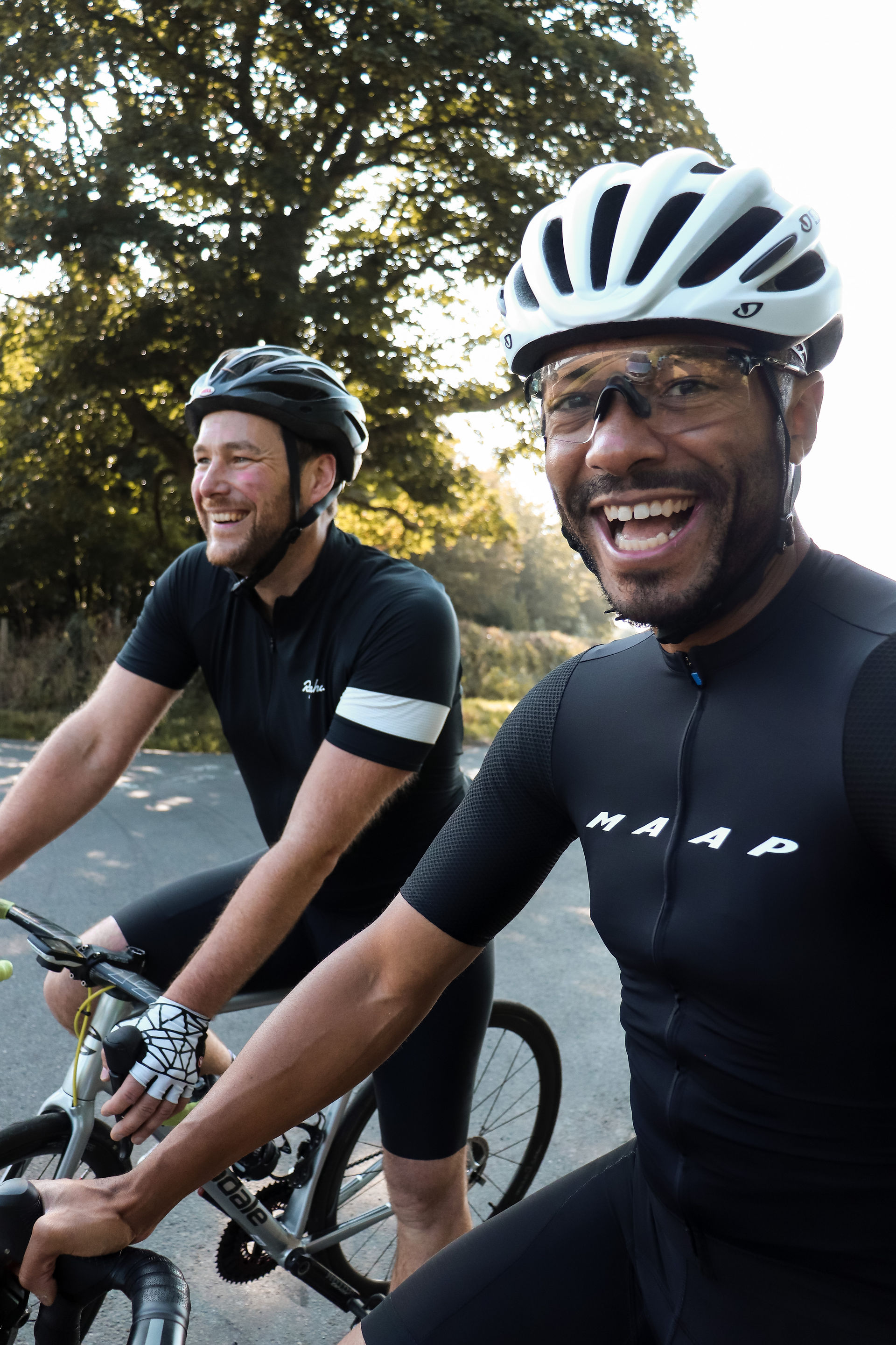 Road cyclists in the Cotswolds villages