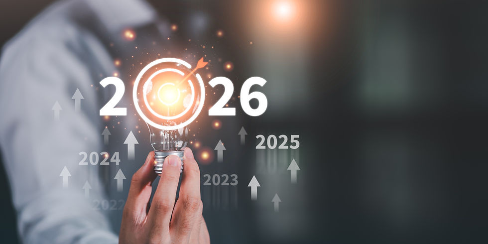 Hand holding glowing light bulb with 2026 target goal with rising arrows.