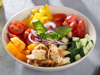 a bowl of heirloom tomato salad