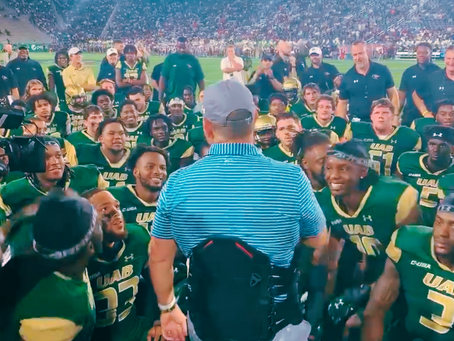 A strange day and a warm UAB embrace for Bill Clark