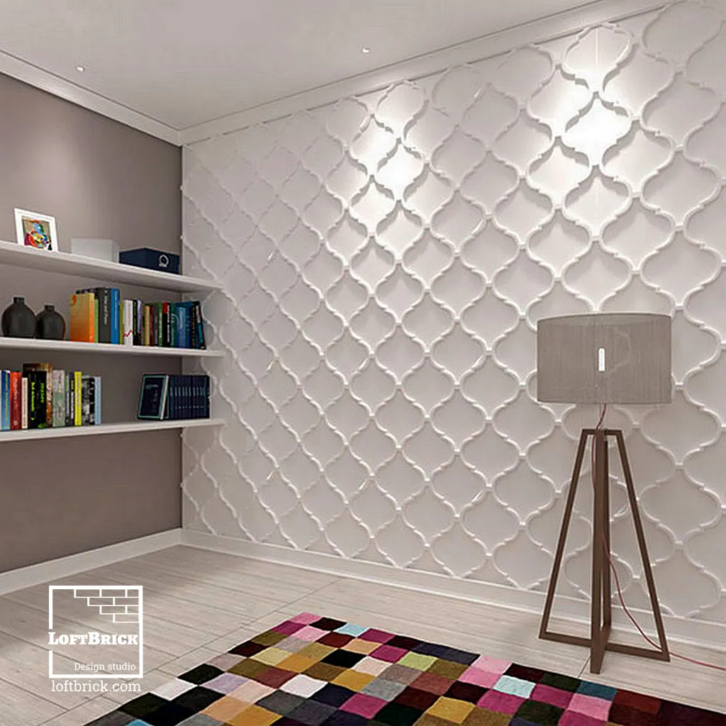 Стена облицована белыми гипсовыми 3D панелями