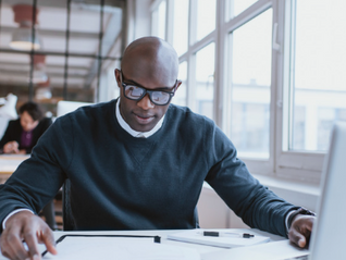 man working at desk
