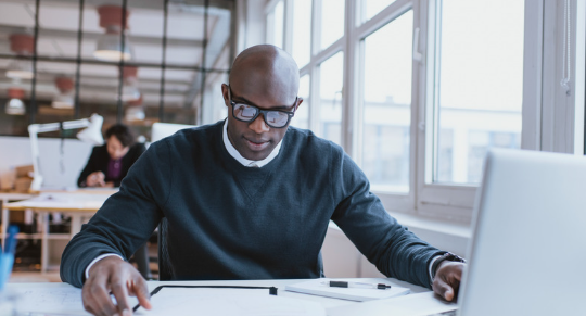 man working at a desk