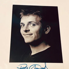 Black and white signed photograph of Rik Mayall
