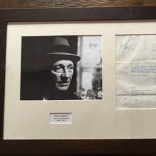 Black and white photo of Bing Crosby with a letter from the artist