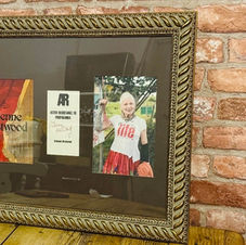 A framed photo and memorabilia